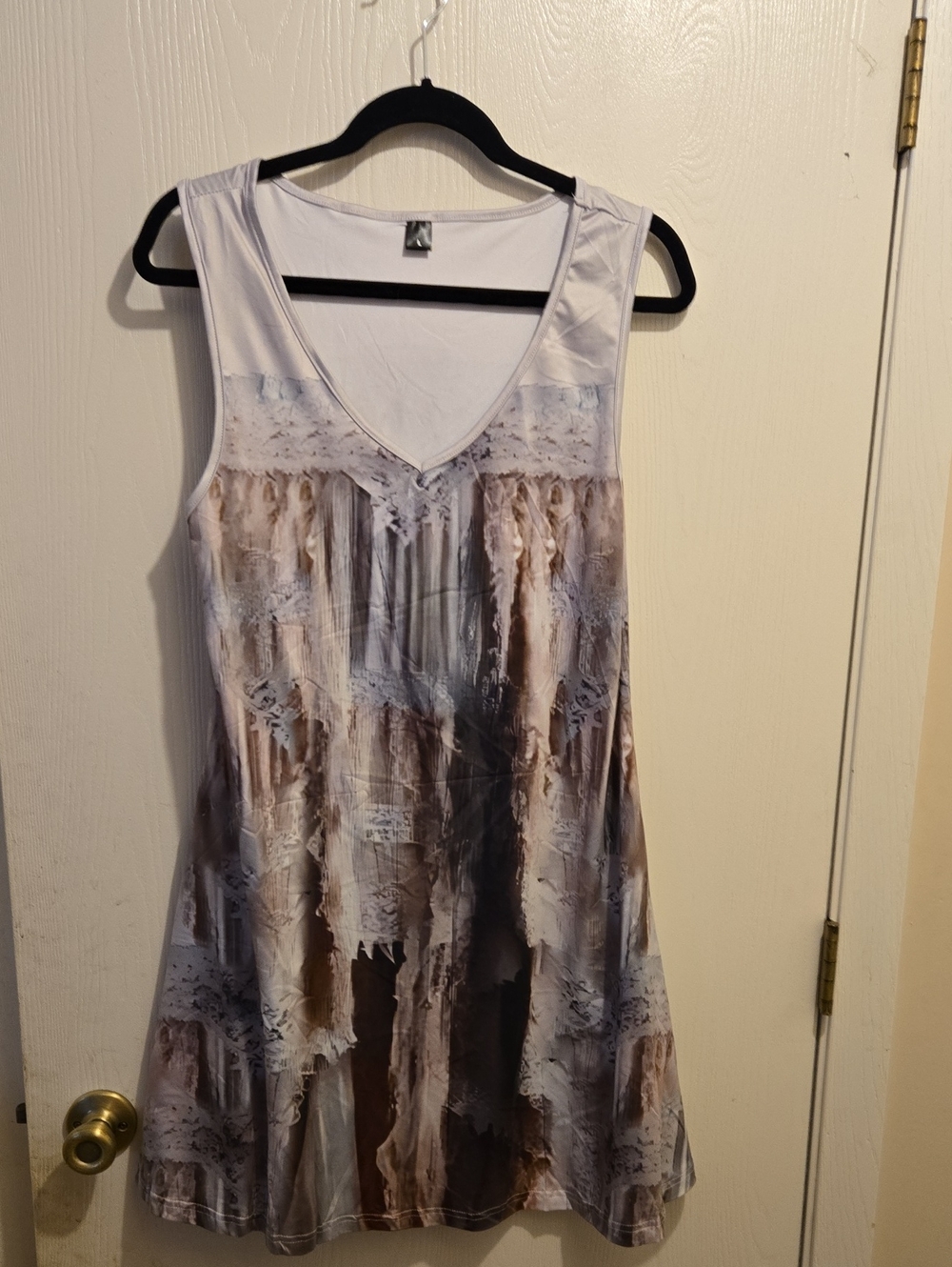 Sleeveless V-Neck Printed Swing Dress in Neutral Brown and White. L32